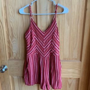 red and white striped romper. adjustable spaghetti straps.